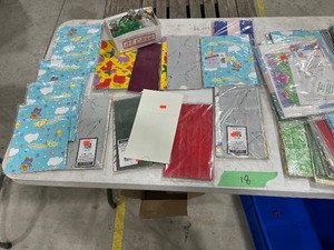 TABLE FULL OF GIFT BAGS
