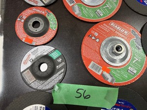 TABLE FULL OF ABRASIVE SAW BLADES 6-12, 7, & 4-12 MASONRY