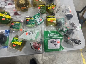 TABLE FULL OF TRIMMER PARTS