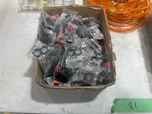 TABLE FULL OF CLAMPS, HOSES, & EASY BAGGER