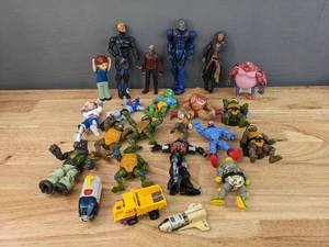 lot 89 image: Collection of Vintage Action Figures TMNT, GI Joe, Power Rangers, He-Man, X-Men and More F