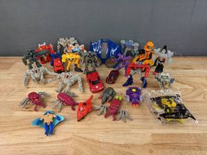 lot 90 image: Collection of Vintage Transformer Action Figures Tiny Turbo Chargers, Rescue Bots, McDonalds Toys, Burger Kind Toys and More F