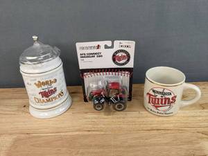 lot 87 image: Lot of 3 Minnesota Twins Collectibles Beer Stein, Mug & 164 Ertle Case Tractor Replica E