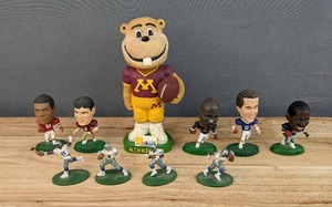 lot 123A image: Collection of 5 NFL National Football League 3 Figurines, University of MN Goldie Gopher and 4 Dallas Cowboy 2 Figurines E