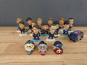 lot 95 image: Lot of 13 NHL 3 Corinthian Headliners Figures, 3 Mini-Goalie Masks & 1 Mini-Zamboni E