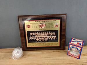 lot 75 image: 1987 Twins Memorabilia  World Champion Plaque, Twins Autographed Baseball, and Twins Central Division Champion Baseball E
