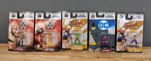 lot 135 image: (5) WWE, Street Fighter, and DC Nano MetalFigs E