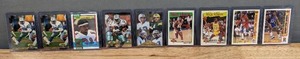 lot 129A image: Magic Johnson Emmitt Smith Deion Sanders Barry Sanders BasketballFootball Card Collection NBA NFL Los Angeles Lakers Dallas Cowboys Atlanta Falcons Detroit Lions Hoops Upper Deck Pinnacle Topps E