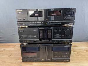 lot 76A image: 3-Piece Fisher Studio Standard Music Set - CR W9535 Dual Cassete Deck, CA-9535 Integrated Stereo Amplifier, and DAC-9535 Disc PlayerChanger E