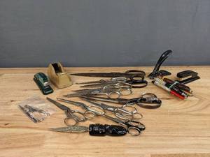 lot 149 image: Desk Supplies includes Scissors, Tape Dispenser, Pens, Stapler, and Letter Opener E