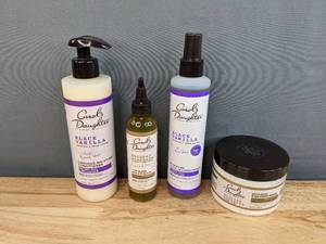 lot 63C image: Brand New Carols Daughter Black Vanilla Conditioner, Leave-in Conditioner, Goddess Strength 7 Oil Blend, & Repairing Cocoon Mask Retail Value $61.32 I