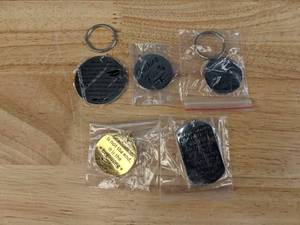 lot 172 image: (5) Inspirational Graduation-Themed Keychains F