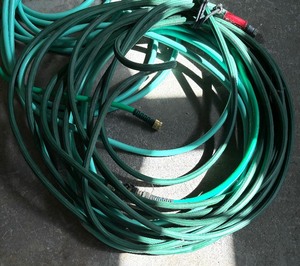 lot 111 image: Two Garden Hoses