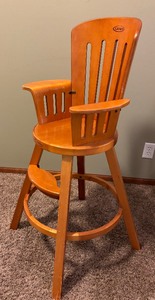 lot 128 image: Wooden Chair by Graco