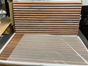 lot 25 image: 4 Pack of Wood Slat Acoustic Wall Panels