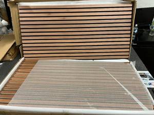 lot 26 image: 4 Pack of Wood Slat Acoustic Wall Panels