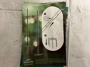 lot 29 image: 4 Pack of String Light Hanging Poles