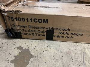 lot 53 image: 5 Drawer Dresser - Color Black Oak - Looks like assembly was attempted