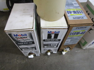 lot 31 image: Partial Containers Oil