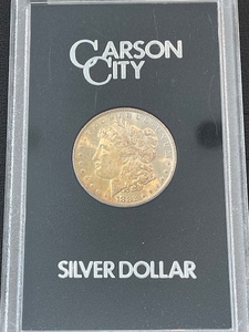 lot 1 image: 1882-CC Morgan Dollar Toned