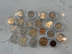 lot 76 image: Assorted Coins, Includes Dollars, Quarters, Cents