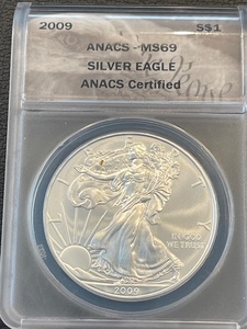 lot 23 image: 2009 Silver Eagle ANACS MS69
