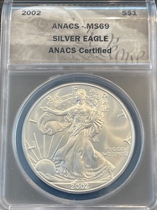 lot 30 image: 2002 Silver Eagle ANACS MS69