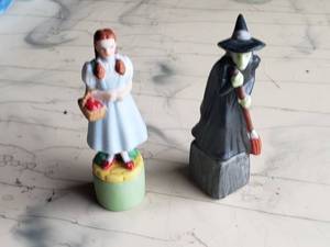 lot 17 image: Dorothy and Wicked Witch Figurines