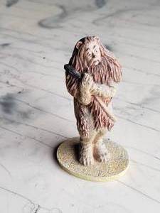 lot 23 image: Cowardly Lion Figurine