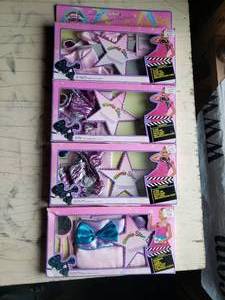 lot 57 image: Lot of 4 Glamorous Fashion Sets