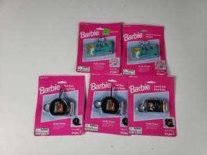 lot 92 image: Lot of 5 Barbie Keychains