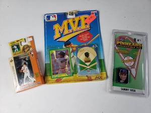 lot 209 image: Sammy Sosa Pin, Baltimore Orioles Figure