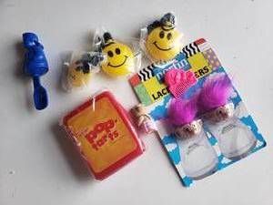 lot 221 image: Trolls Shoelace Things, Pop Tarts Toy and More