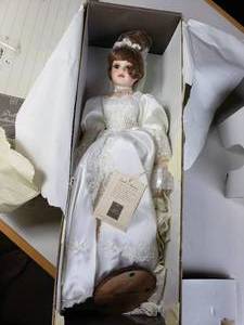 lot 251 image: 24 Porcelain Doll by the Doll Collection