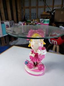 lot 257 image: Girl Eating Cupcake Small Glass Top Table