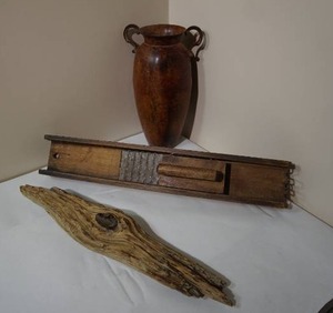 lot 54 image: Vintage Primitive Wood Kraut Cutter Masher, Metal Vase, Driftwood