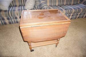 lot 105 image: Vintage Solid Wood Cherry() Dovetail Drawer Drop Leaf Tea Service Cart on Wheels With Removable Glass Top...