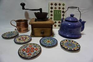 lot 129 image: Antique Wood Cast Counter Coffee Grinder, Vintage Porcelain Blue Speckled Teapot, Copper Mug