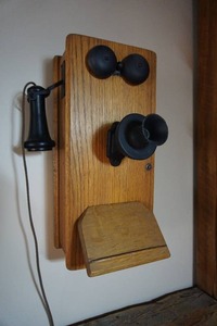 lot 21 image: Antique Primitive Kellogg Company Wood Notched-Oak Wall Mount Crank Telephone