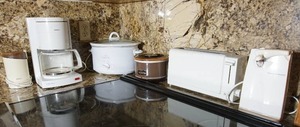 lot 233 image: Countertop Electric Kitchen Appliances Including Hamilton Beach Can Opener Knife Sharpener, Rival Crock-Ette Slow Cooker, Rowenta Slice Bagel Toaster, Rival Crockpot, Krups Coffee Grinder, Krups Compact Aroma