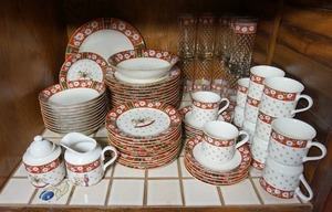 lot 226 image: Holiday Christmas Dinnerware Set Charlton Hall Kobe Classic Traditions White Floral On Red wRocking Horse Pattern...