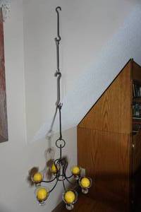lot 315 image: Vintage Candelabra Adorned with Some Hard to Find Round Candles and Additional Antique Hanging Hooks