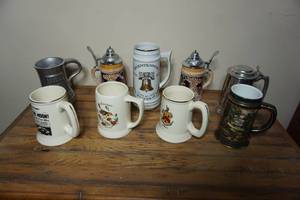 lot 319 image: Collection of Vintage Beer Steins Mugs Pewter Porcelain Ceramic Germany Montana Ben Silver Wilton Etc.