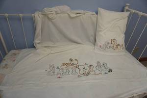 lot 340 image: Vintage Linen Textile Baby Bed Crib Embroidered Baby Animals Slip and Sheet....
