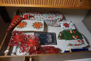 lot 349 image: Holiday Linen Christmas Textile Table Runners Apron Doilies Scandinavian Gnomes Etc.