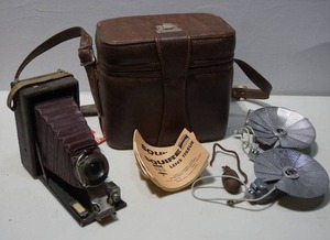 lot 473 image: Antique Folding Camera Patent Date 1908() Leather Case Flash Reflectors Squire Lens Tissues Etc.