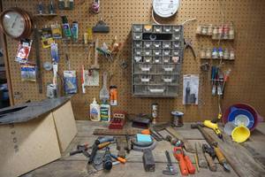 lot 503 image: Garage...Contents on Work Bench and Wall Above