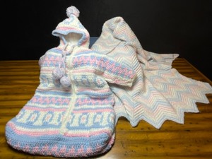 lot 728 image: Vintage Crocheted Knit Baby Onesie Jumpsuit Afghan