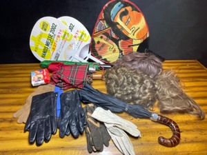 lot 736 image: Vintage Wigs Umbrellas Hand-Fans Gloves Etc.