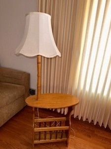 lot 2 image: Two Matching Vintage End Table Lamp with Magazine Rack Measuring 24D x 11.5W x 25 H at the table and 57 H at top of lamp